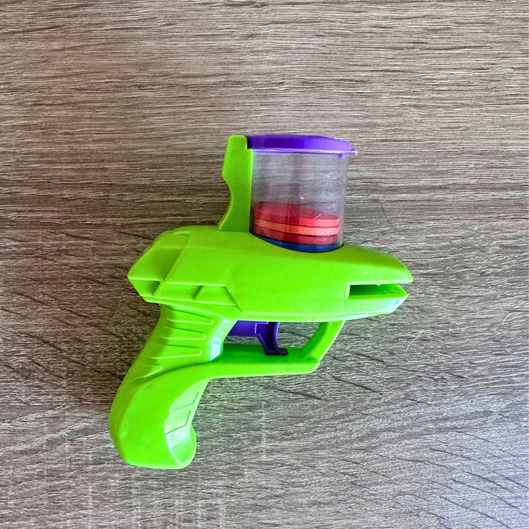Mini pistola lanzadora de discos